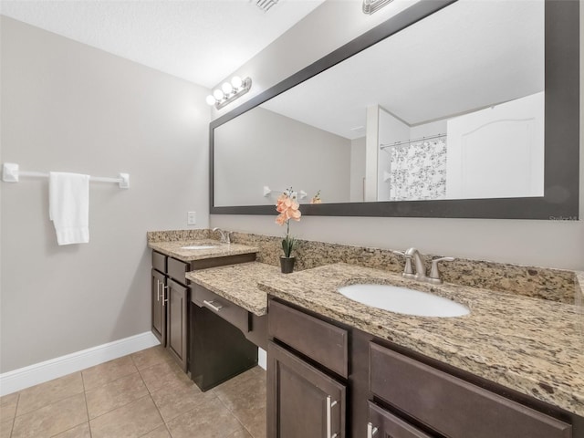 8215 Roseville Blvd, Davenport, FL 33896 - full bathroom featuring tile patterned flooring, baseboards, and vanity