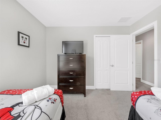8215 Roseville Blvd, Davenport, FL 33896 - carpeted bedroom featuring baseboards and a closet