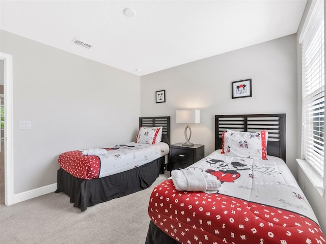 8215 Roseville Blvd, Davenport, FL 33896 - carpeted bedroom featuring baseboards