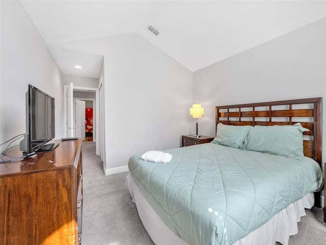 8215 Roseville Blvd, Davenport, FL 33896 - carpeted bedroom featuring vaulted ceiling and baseboards
