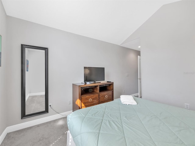 8215 Roseville Blvd, Davenport, FL 33896 - bedroom featuring carpet floors, lofted ceiling, and baseboards