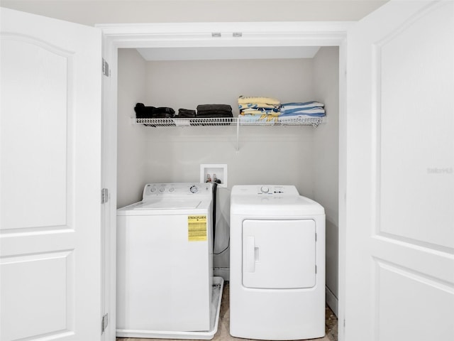 8215 Roseville Blvd, Davenport, FL 33896 - laundry area featuring independent washer and dryer