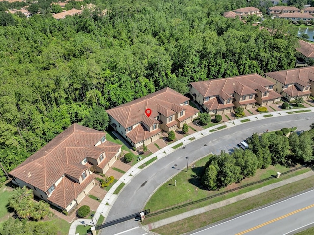 8215 Roseville Blvd, Davenport, FL 33896 - aerial perspective of suburban area featuring a forest
