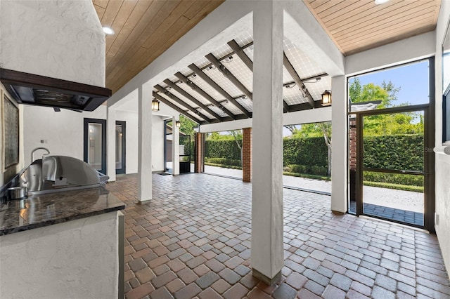 1741 Palmer Ave, Winter Park, FL 32789 - view of patio with an outdoor kitchen