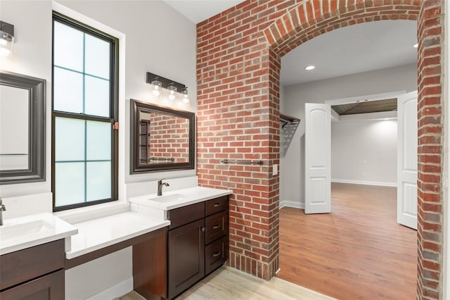 1741 Palmer Ave, Winter Park, FL 32789 - bathroom with plenty of natural light, wood finished floors, vanity, and baseboards