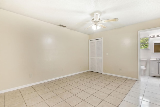 896 Satin Leaf Cir, Ocoee, FL 34761 - unfurnished room with ceiling fan, light tile patterned flooring, and baseboards