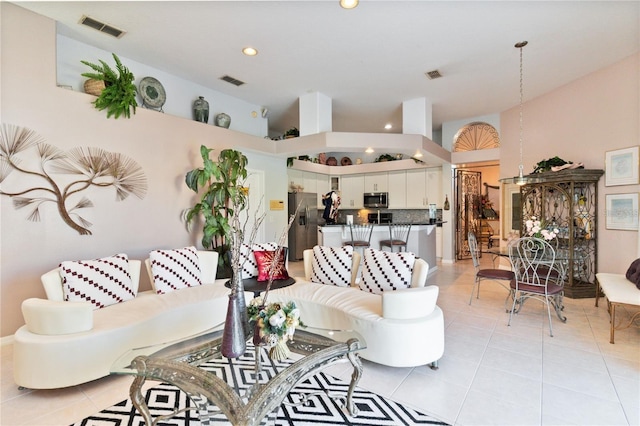 10642 Cloudview Dr, Orlando, FL 32825 - living area featuring light tile patterned floors and recessed lighting