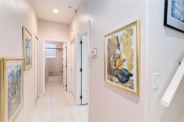 10642 Cloudview Dr, Orlando, FL 32825 - hallway with light tile patterned floors