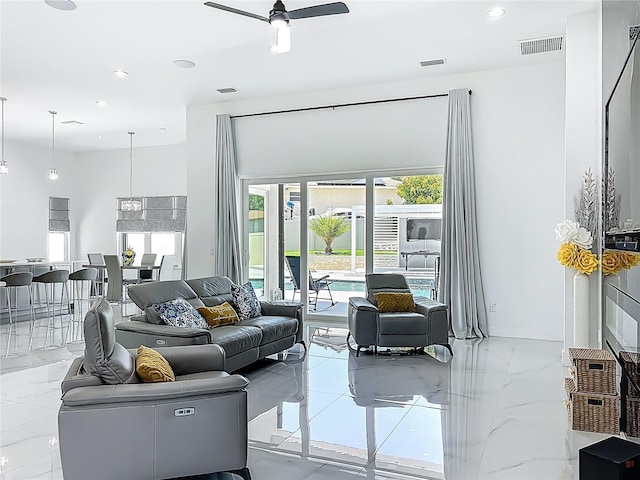 601 Green Briar Blvd, Altamonte Springs, FL 32714 - living area with a ceiling fan, recessed lighting, and marble finish floors
