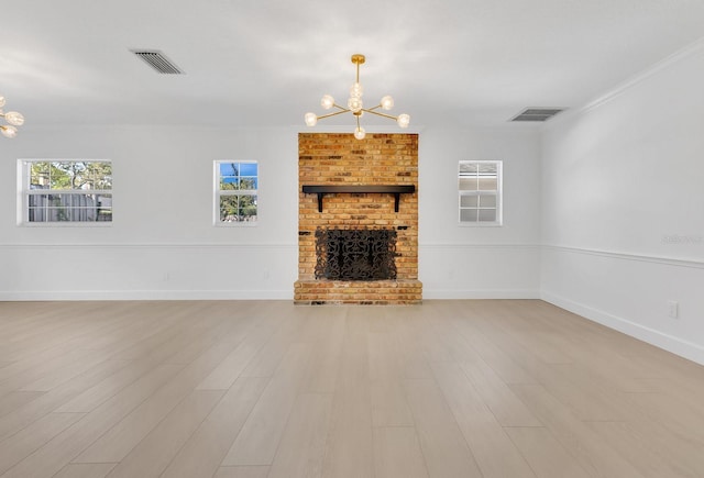 2460 Worthington Rd, Maitland, FL 32751 - unfurnished living room with a chandelier, wood finished floors, baseboards, and ornamental molding