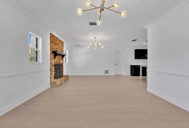 2460 Worthington Rd, Maitland, FL 32751 - unfurnished living room featuring a brick fireplace, a chandelier, crown molding, baseboards, and light wood finished floors
