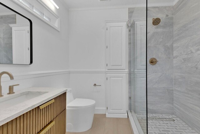2460 Worthington Rd, Maitland, FL 32751 - bathroom with tiled shower, toilet, vanity, and crown molding
