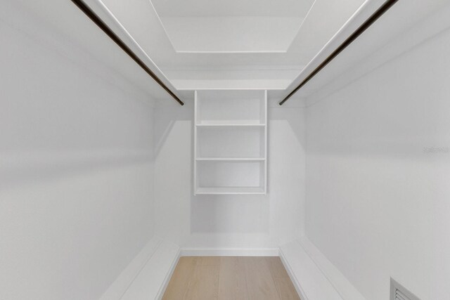 2460 Worthington Rd, Maitland, FL 32751 - spacious closet featuring wood finished floors