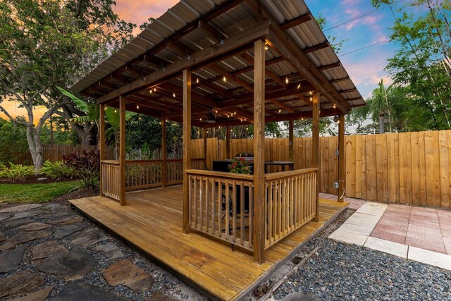 2460 Worthington Rd, Maitland, FL 32751 - deck at dusk featuring a fenced backyard