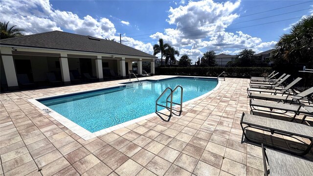 2450 Sweet Viburnum Way, Ocoee, FL 34761 - community pool with a patio