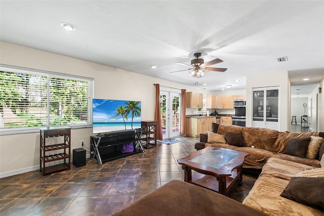 2922 SW 68th Ln, Gainesville, FL 32608 - living room featuring a ceiling fan and french doors
