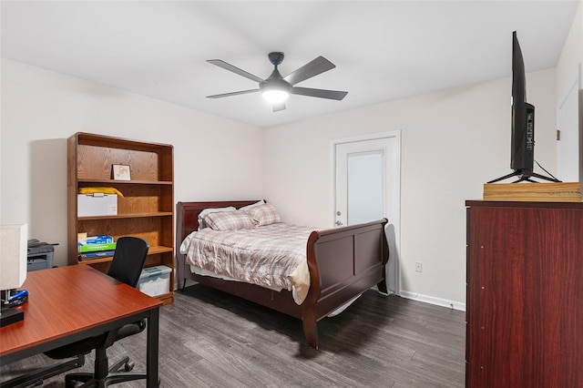 2922 SW 68th Ln, Gainesville, FL 32608 - bedroom featuring wood finished floors, an office area, and ceiling fan