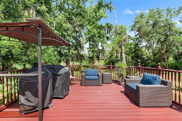 2922 SW 68th Ln, Gainesville, FL 32608 - wooden terrace with view of scattered trees and grilling area