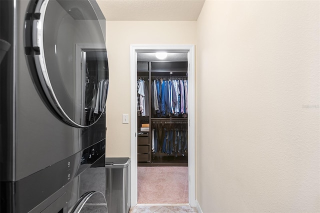 14095 Tropical Kingbird Way, Riverview, FL 33579 - laundry area with stacked washer / drying machine