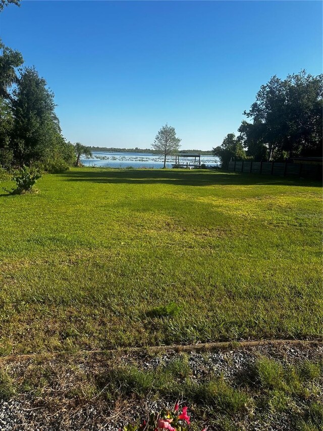 37951 Washington Loop Rd, Punta Gorda, FL 33982 - view of grassy yard with a water view