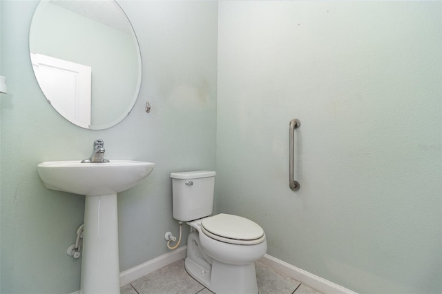 2061 Rush Bay Way, Orlando, FL 32824 - half bath featuring toilet and tile patterned floors