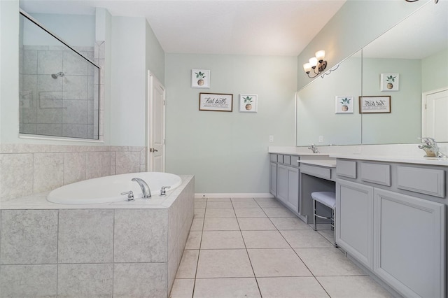 2061 Rush Bay Way, Orlando, FL 32824 - bathroom with double vanity, a bath, tile patterned flooring, and tiled shower