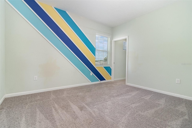 2061 Rush Bay Way, Orlando, FL 32824 - spare room featuring carpet and baseboards