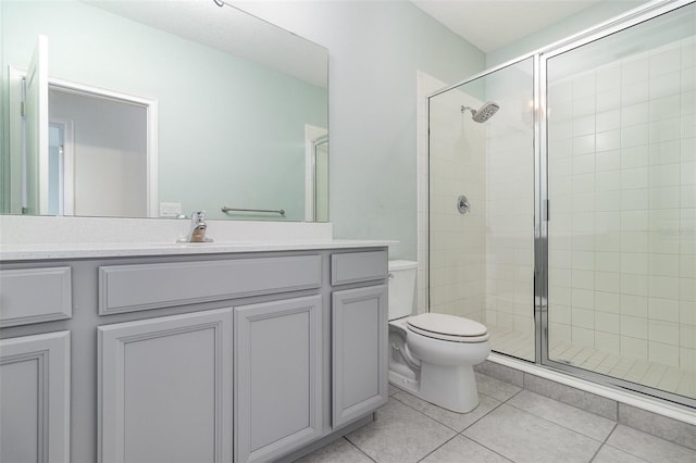 2061 Rush Bay Way, Orlando, FL 32824 - bathroom with tile patterned flooring, vanity, and a stall shower