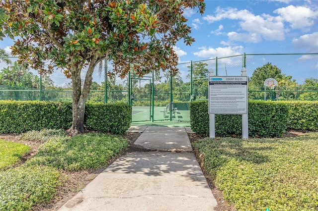 2061 Rush Bay Way, Orlando, FL 32824 - view of community with a gate and a tennis court