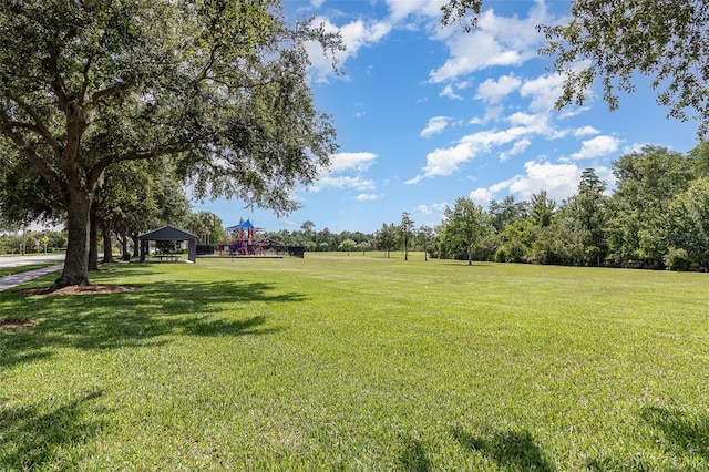 2061 Rush Bay Way, Orlando, FL 32824 - view of grassy yard featuring a gazebo