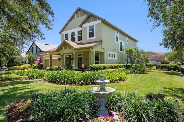 402 S Lake Victoria Cir, Deland, FL 32724 - view of front of home featuring stucco siding, a front yard, and a shingled roof