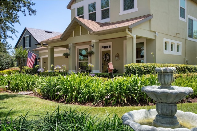 402 S Lake Victoria Cir, Deland, FL 32724 - doorway to property with stucco siding and a shingled roof