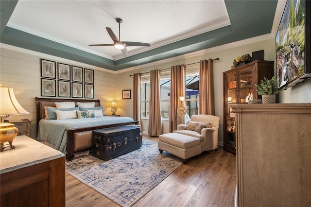 402 S Lake Victoria Cir, Deland, FL 32724 - bedroom with crown molding, wood finished floors, and a ceiling fan