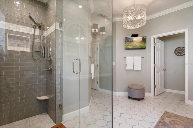 402 S Lake Victoria Cir, Deland, FL 32724 - bathroom with ornamental molding, a stall shower, tile patterned flooring, and baseboards