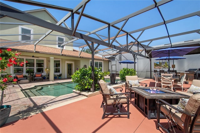 402 S Lake Victoria Cir, Deland, FL 32724 - view of patio / terrace with glass enclosure, an outdoor pool, and an outdoor living space with a fire pit