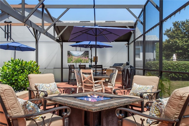 402 S Lake Victoria Cir, Deland, FL 32724 - view of patio featuring a fire pit and a lanai