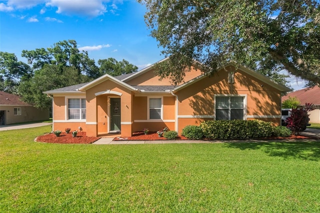2619 Breezy Meadow Rd, Apopka, FL 32712 - single story home with stucco siding and a front yard
