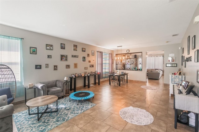 2619 Breezy Meadow Rd, Apopka, FL 32712 - living area with a chandelier