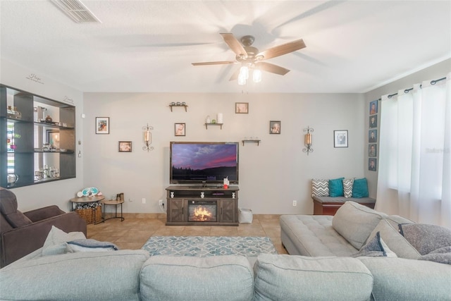 2619 Breezy Meadow Rd, Apopka, FL 32712 - living area with tile patterned flooring and ceiling fan
