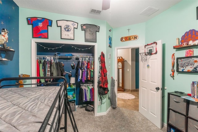 2619 Breezy Meadow Rd, Apopka, FL 32712 - carpeted bedroom with a closet and ceiling fan
