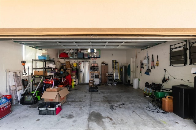 2619 Breezy Meadow Rd, Apopka, FL 32712 - garage with stainless steel fridge with ice dispenser and water heater
