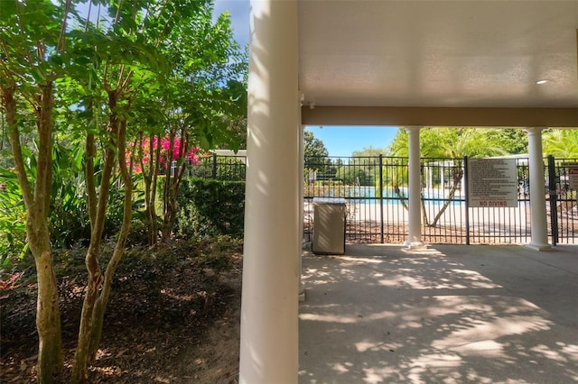 2619 Breezy Meadow Rd, Apopka, FL 32712 - view of patio featuring a community pool