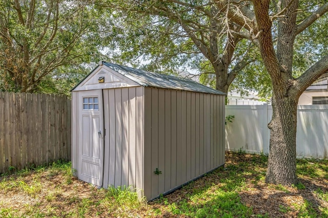 2354 Barons Ct, Tavares, FL 32778 - view of shed featuring a fenced backyard