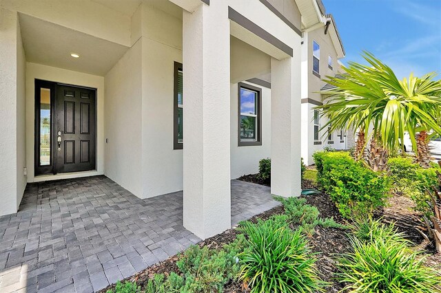 3860 Sonoma Blvd, Kissimmee, FL 34741 - entrance to property with stucco siding