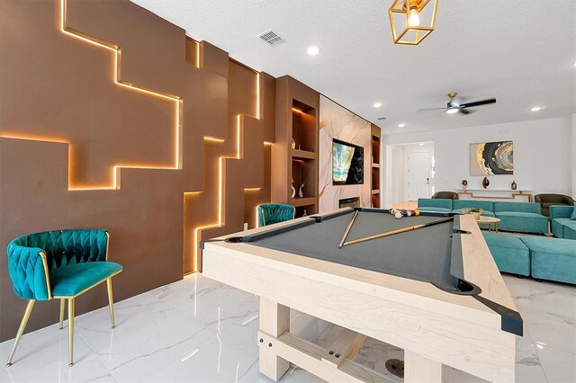 3860 Sonoma Blvd, Kissimmee, FL 34741 - recreation room with light marble finish flooring, a ceiling fan, recessed lighting, built in shelves, and pool table