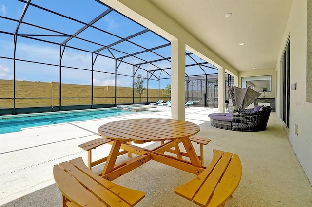 3860 Sonoma Blvd, Kissimmee, FL 34741 - view of patio featuring a pool with connected hot tub and a lanai