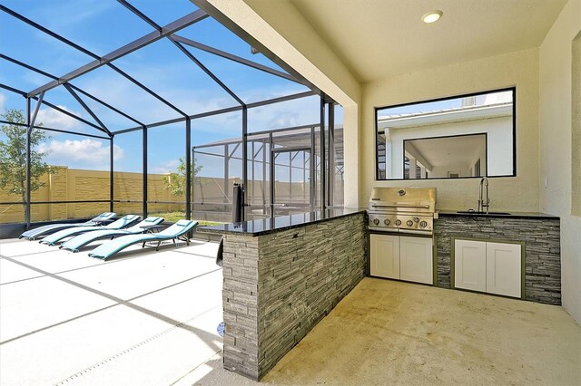 3860 Sonoma Blvd, Kissimmee, FL 34741 - view of patio / terrace featuring a sink and glass enclosure