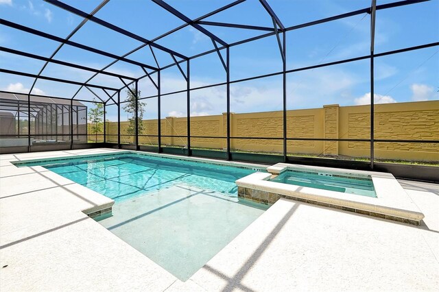 3860 Sonoma Blvd, Kissimmee, FL 34741 - view of pool with a patio, a pool with connected hot tub, and a lanai