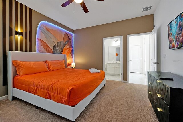 3860 Sonoma Blvd, Kissimmee, FL 34741 - bedroom featuring carpet flooring, ensuite bath, ceiling fan, and baseboards