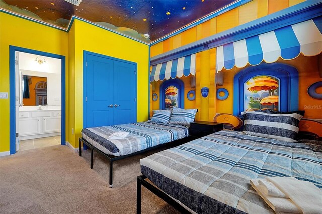 3860 Sonoma Blvd, Kissimmee, FL 34741 - bedroom with carpet floors, ensuite bath, and baseboards